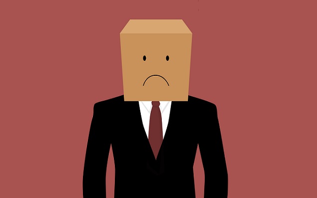 Cardboard businessman with an unhappy face