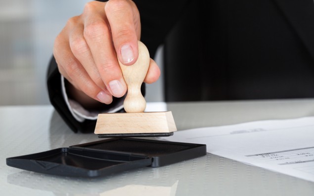 Business Man Hand With Rubber Stamp