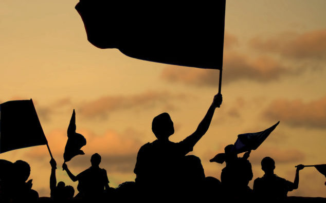 silhouette of protestors