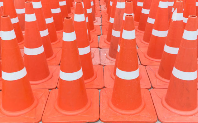 Many traffic cones in day light