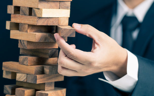 Businessman Builds a Tower