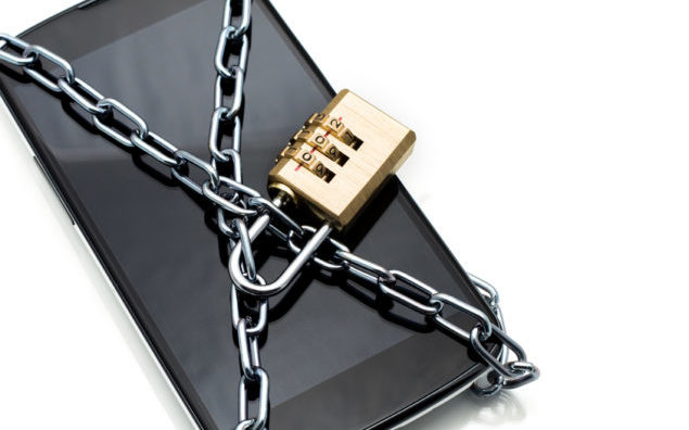Modern smartphone with combination lock padlock. Concept of mobi