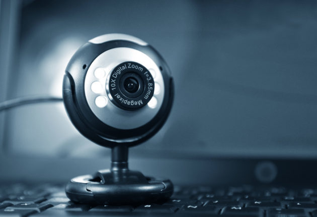 Webcam in front of computer screen
